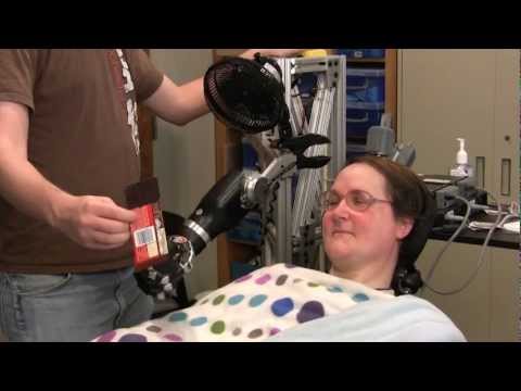 One Giant Bite: Woman with Quadriplegia Feeds Herself Chocolate Using Mind-Controlled Robot Arm