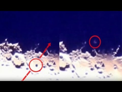 Spinning UFO crosses the dark side of the Moon before disappearing into deep space